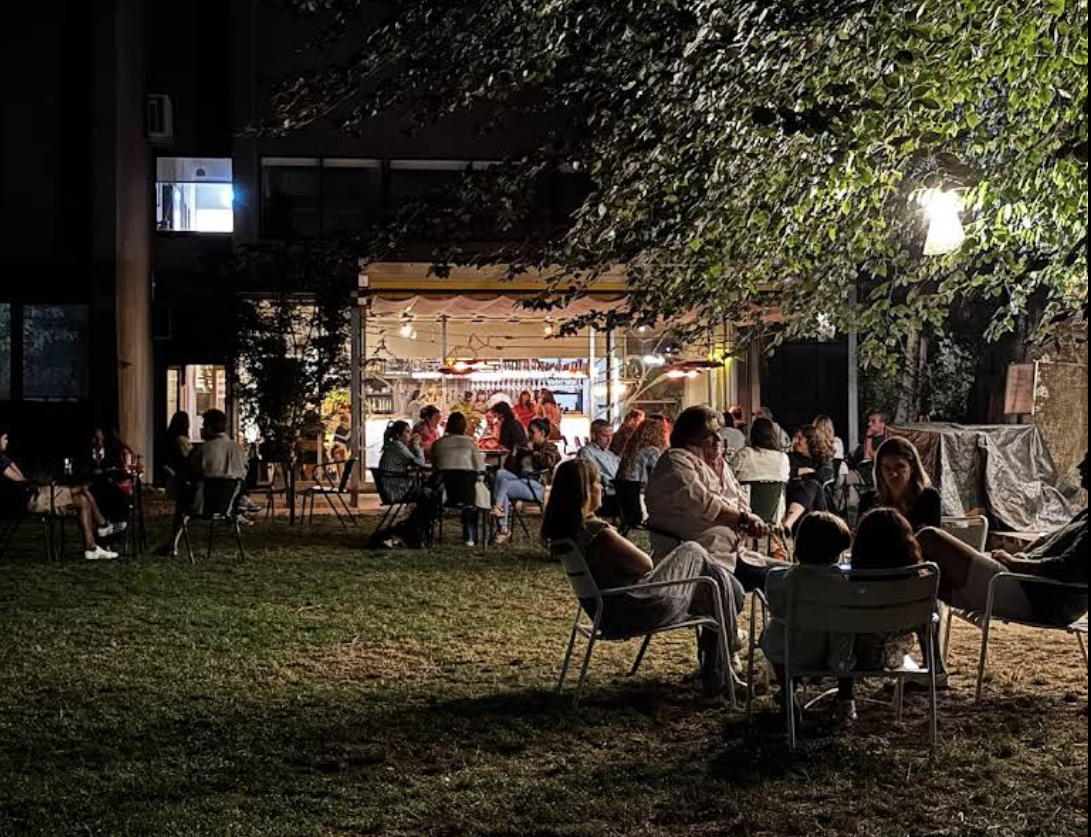 People sitting in the garden drinking beer